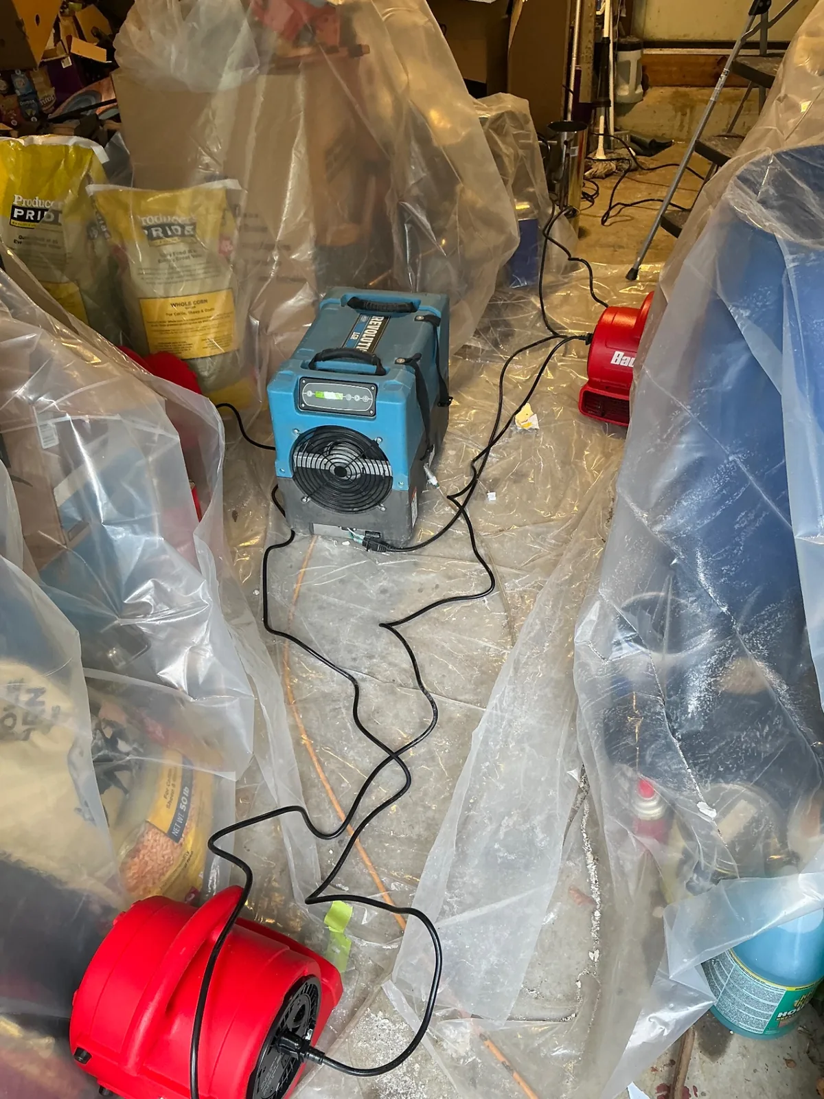 EMC Response dehumidifier, air movers, and containment drying a flooded Prince George's County, Maryland garage